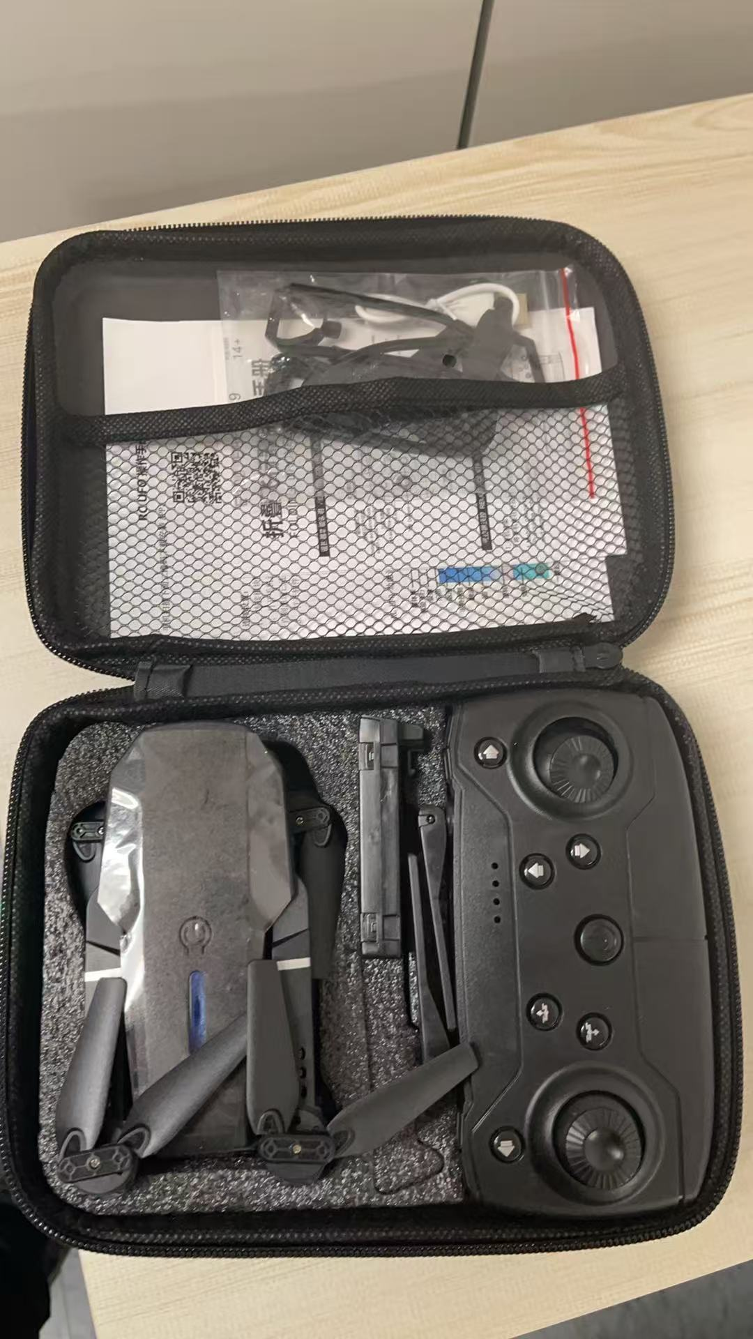 BNIB-E99 Foldable Drone with 1080P HD Camera, RC Quadcopter with 2 Batteries, Altitude Hold
