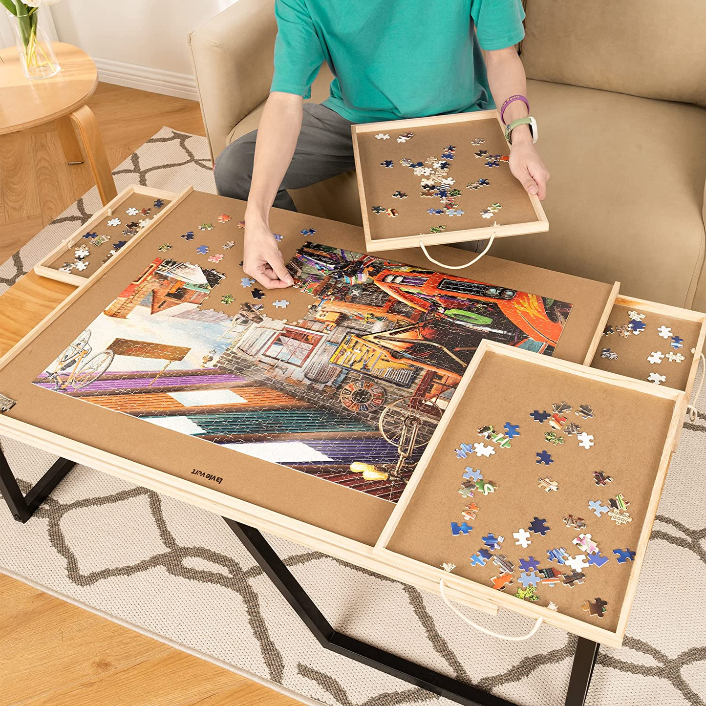 Wooden puzzle table with 4 removable drawers,Dust cover and puzzle pad for up to 1,500 pieces, $60